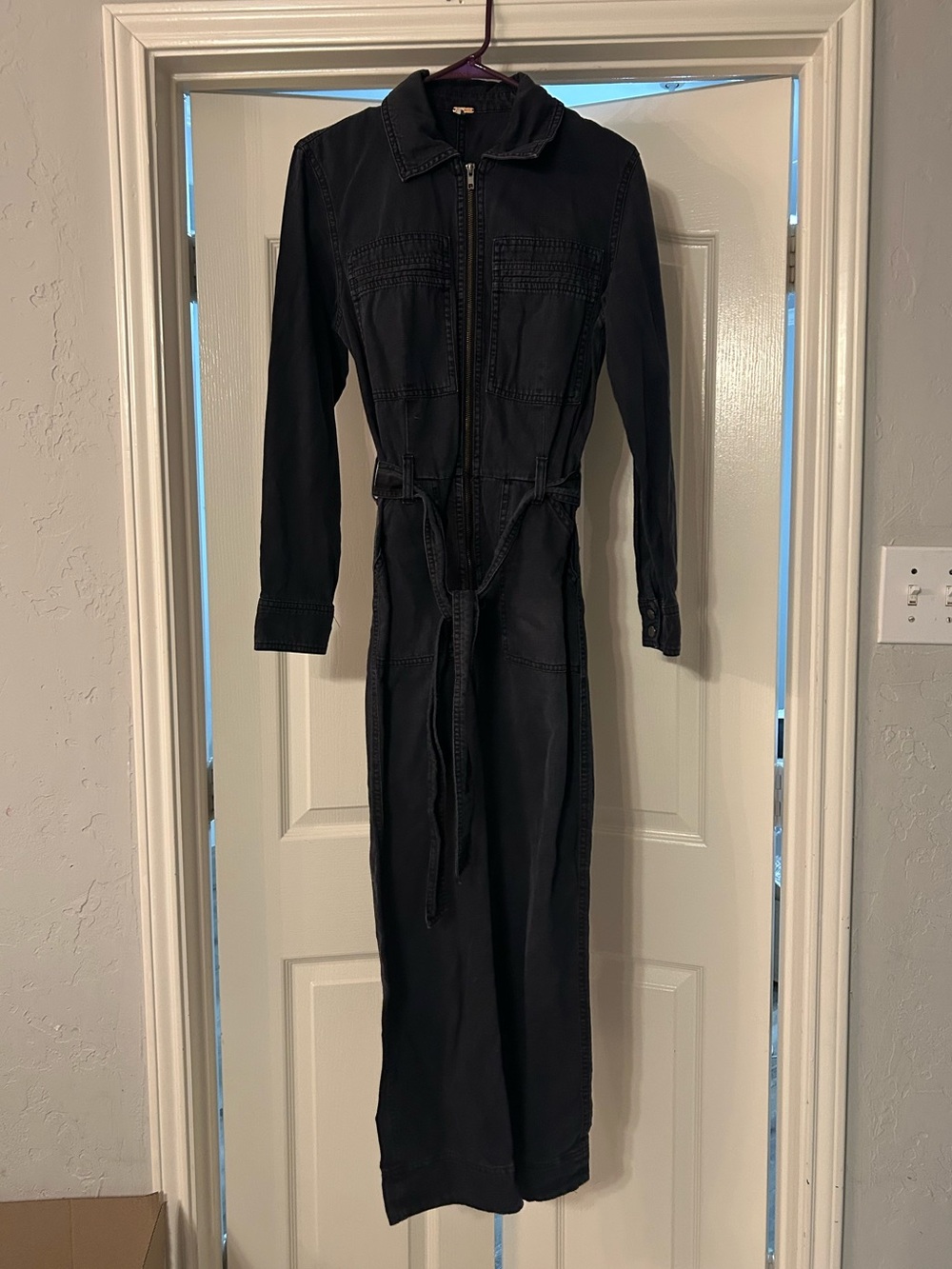 Free People black denim jumpsuit